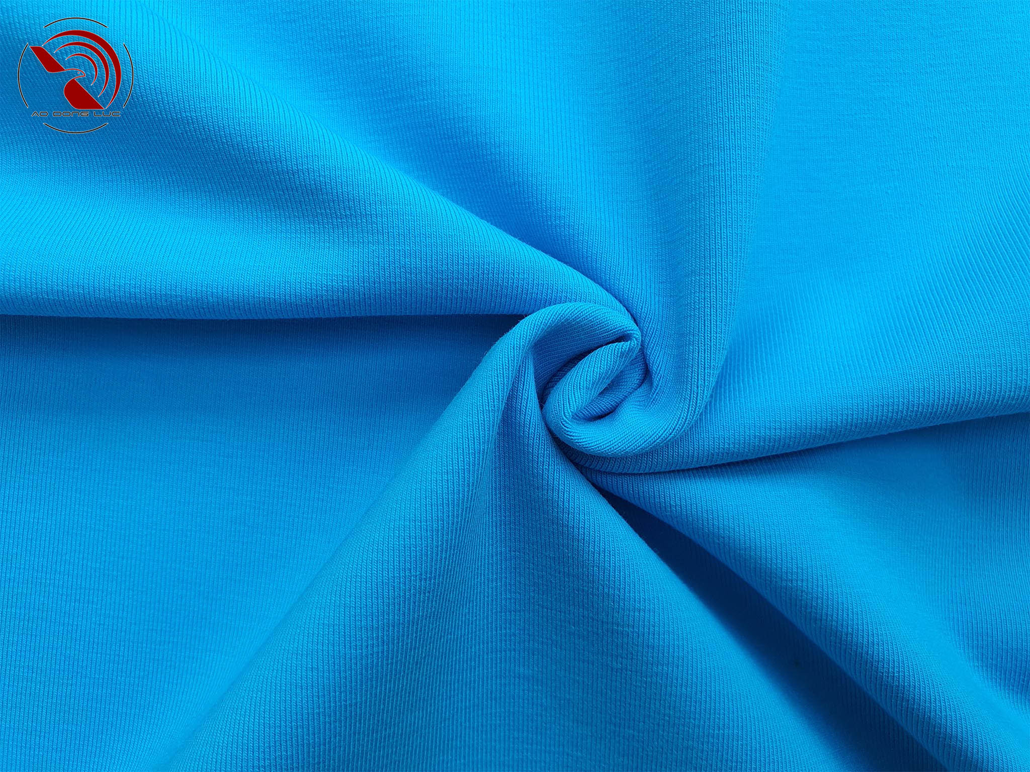 Chất vải áo thun cổ tròn ngắn tay cotton cao cấp xanh ya