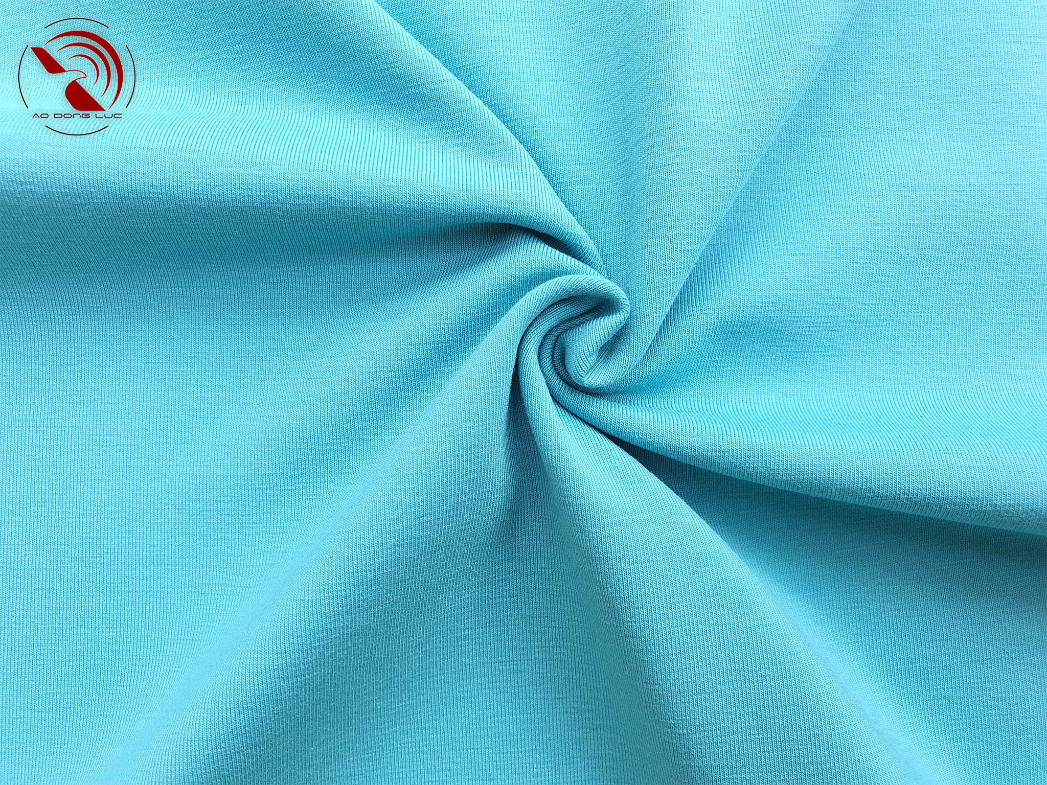 Chất vải áo thun cổ tròn ngắn tay cotton cao cấp màu xanh thiên thanh