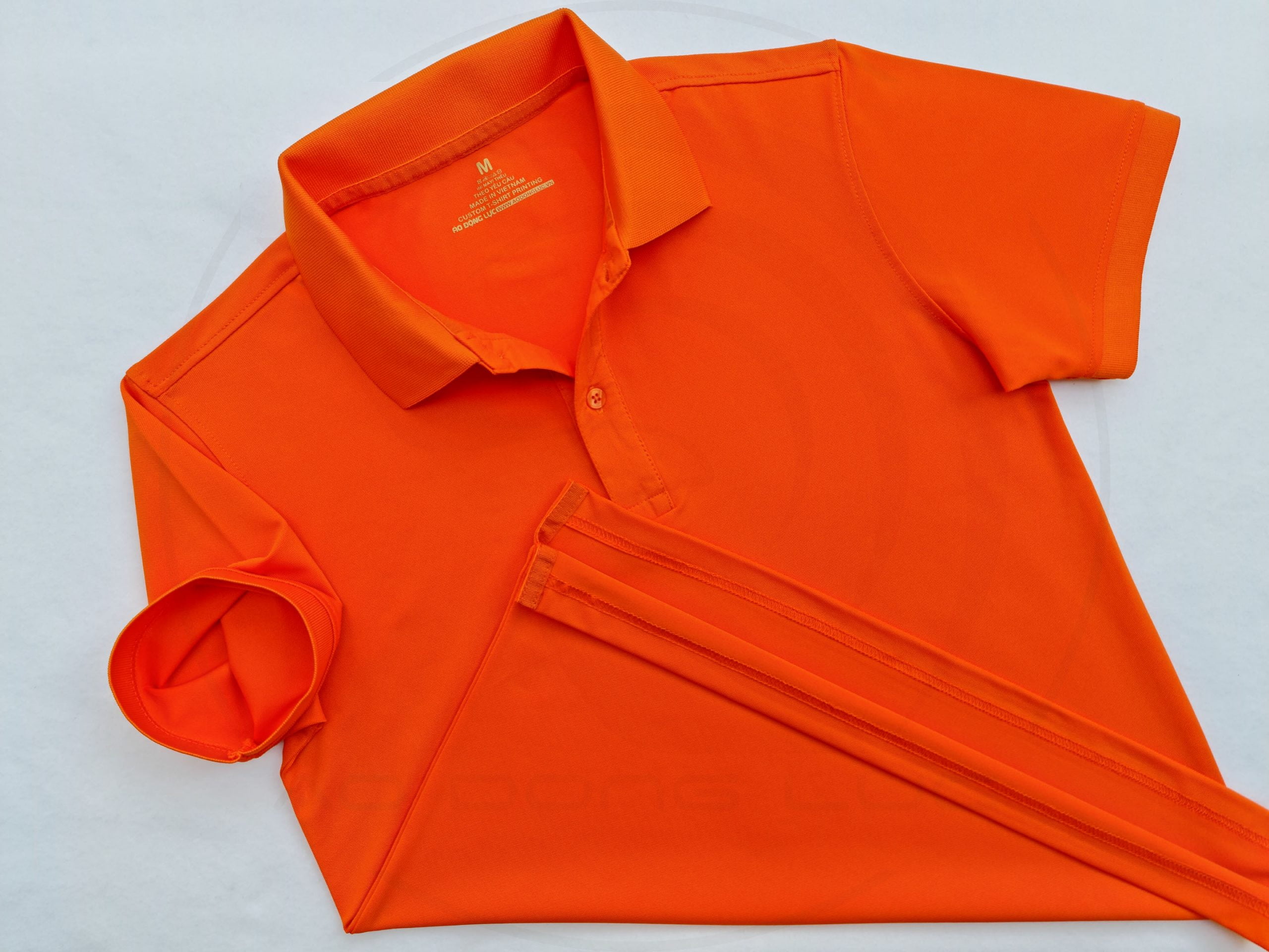 Áo thun cổ trụ polo bo trơn cá sấu lạnh poly thấm hút màu cam
