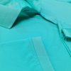 Chi tiết đường may và vạt áo áo thun cổ trụ polo bo trơn cá sấu lạnh xanh ngọc