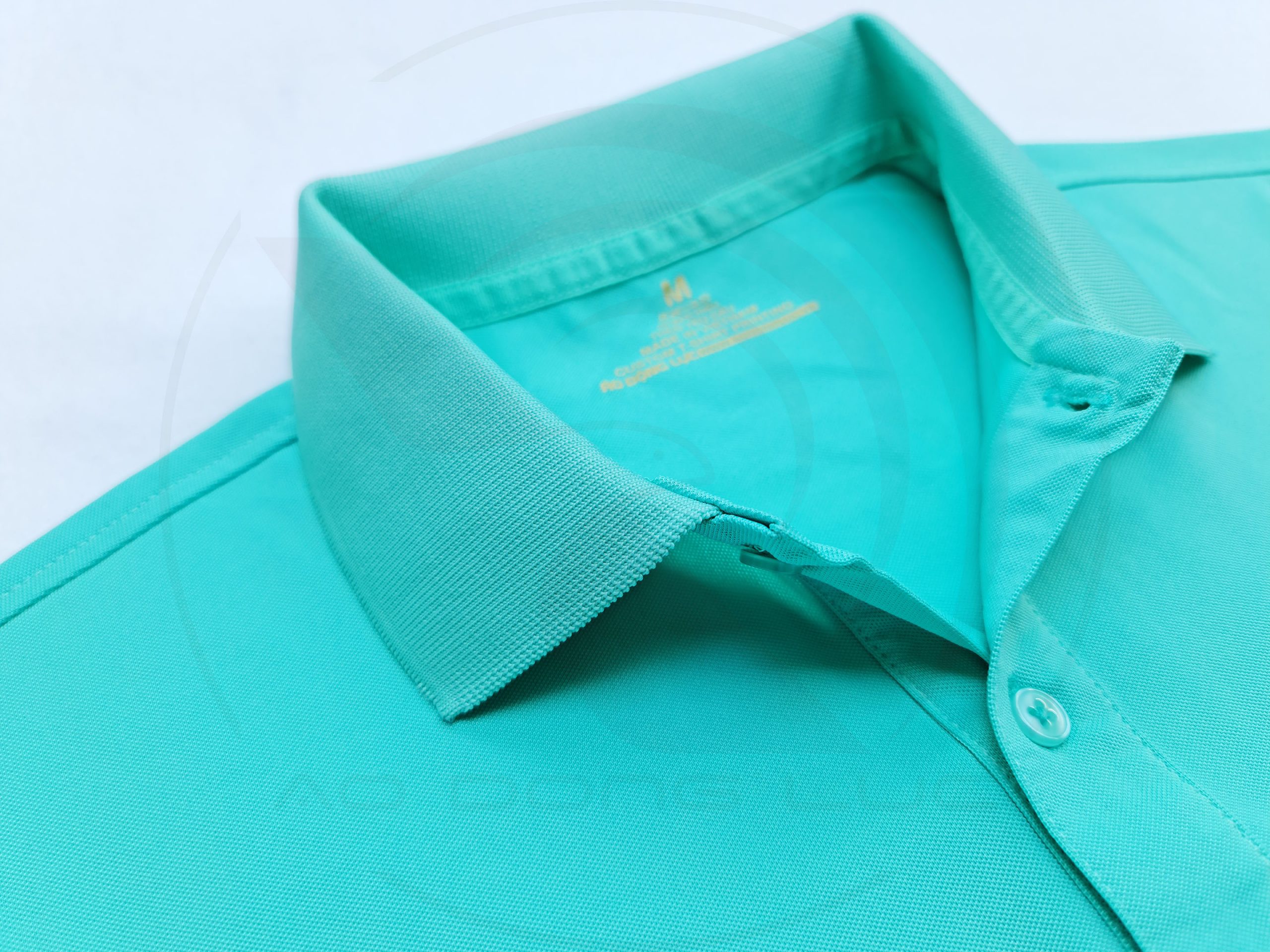 Chi tiết cổ áo áo thun cổ trụ polo bo trơn cá sấu lạnh xanh ngọc