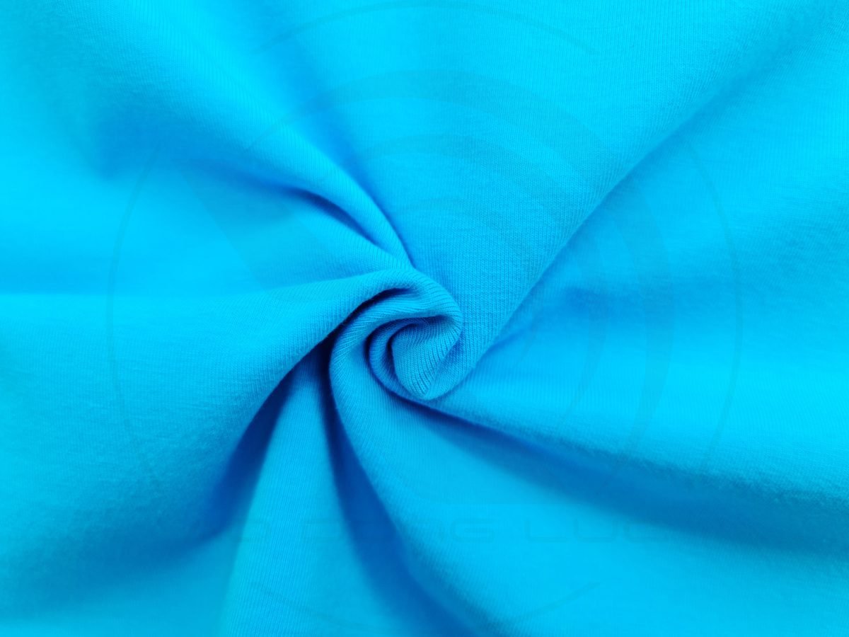 Cận cảnh chất vải áo thun cổ tròn ngắn tay cotton unisex màu xanh ya
