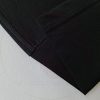 Chi tiết đường may móc xích cầu vai áo thun tay lỡ cotton oversize màu đen