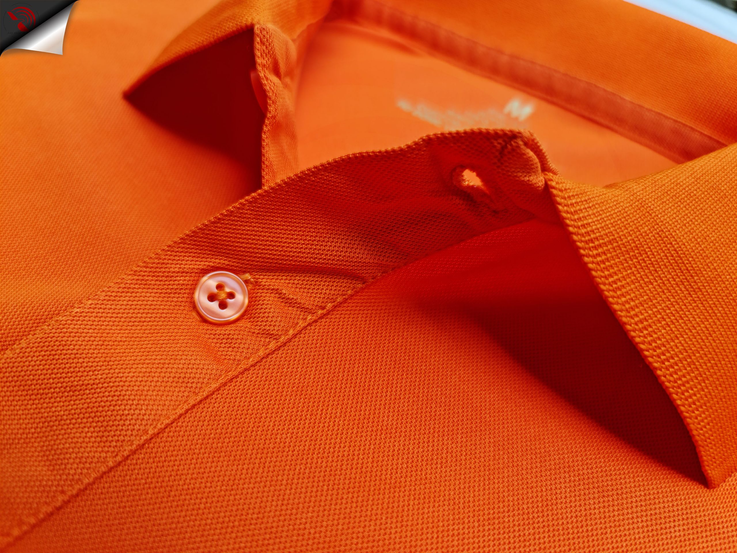 Hình chi tiết trụ áo polo bo trơn cá sấu mè unisex màu cam