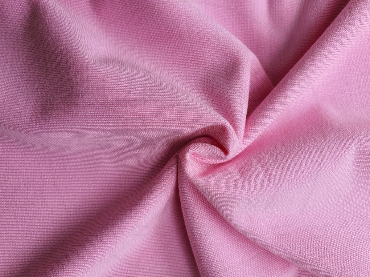 Hình chụp cận cảnh chất vải áo thun cổ tròn ngắn tay supe unisex unisex hồng phấn