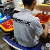 Đồng phục áo thun polo bo trơn màu xám tiêu in chuyển nhiệt