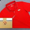 Đồng phục áo thun polo bo sọc màu đỏ in kỹ thuật số logo