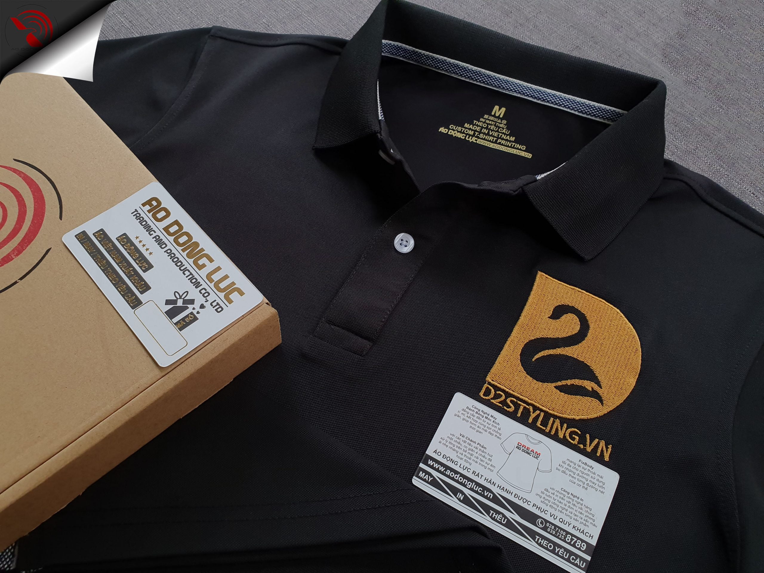 Đồng phục áo thun polo bo trơn màu đen thêu logo