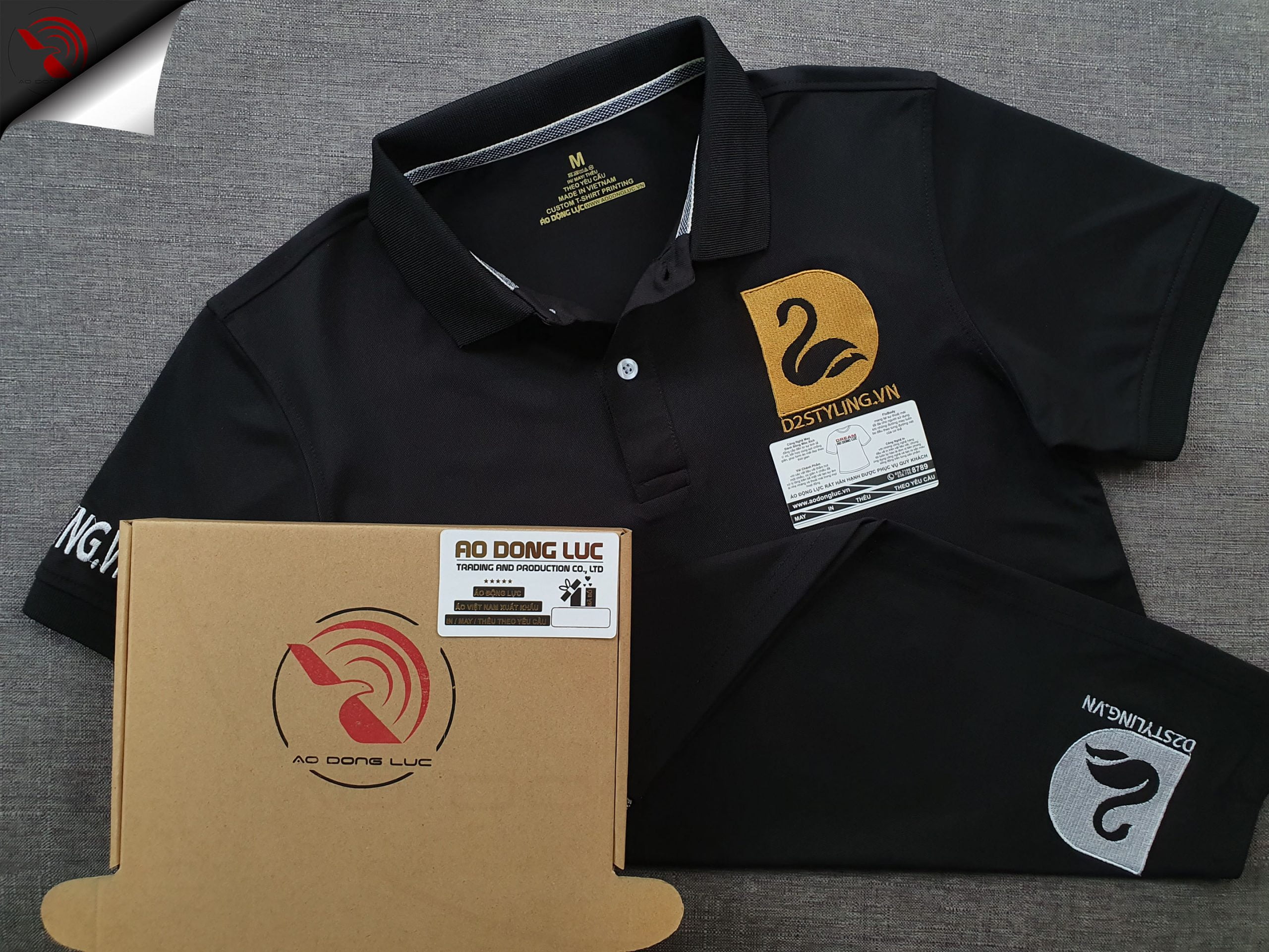 Đồng phục áo thun polo bo trơn màu đen thêu logo