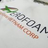 Hình in chuyển nhiệt lên áo thun đồng phục polo màu trắng phối xanh bích
