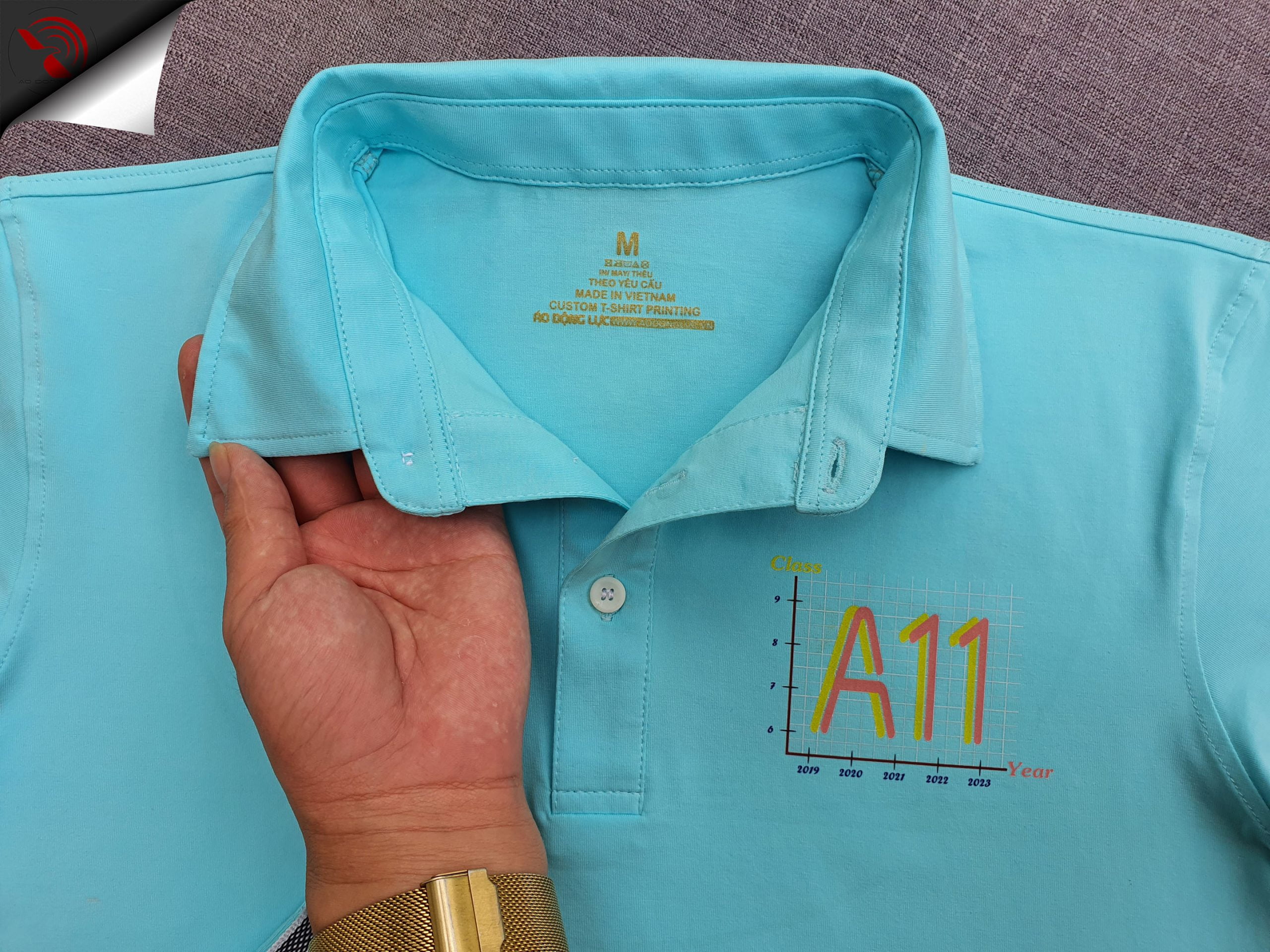 Đồng phục áo thun polo chân cổ sơ mi màu xanh thiên thanh in kỹ thuật số