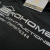 Hình in decal phản quang lên áo thun đồng phục polo bo trơn màu đen