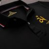 Đồng phục áo thun polo bo sọc màu đen thêu logo