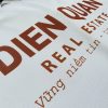 Hình in chuyển nhiệt logo lên áo thun đồng phục polo bo trơn màu trắng