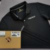 Đồng phục áo thun polo bo trơn màu đen in decal