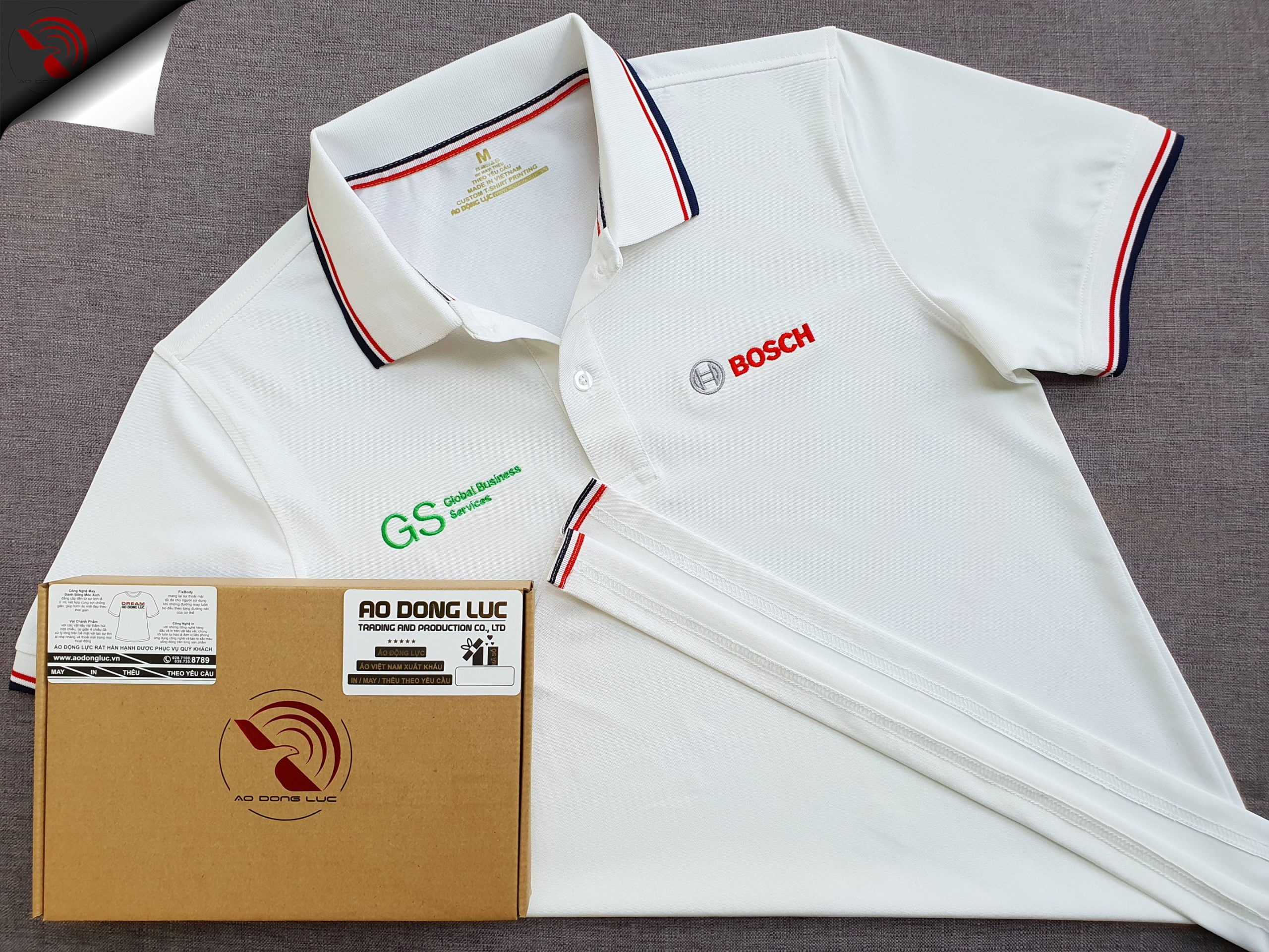 Đồng phục áo thun polo phối bo sọc màu trắng thêu logo
