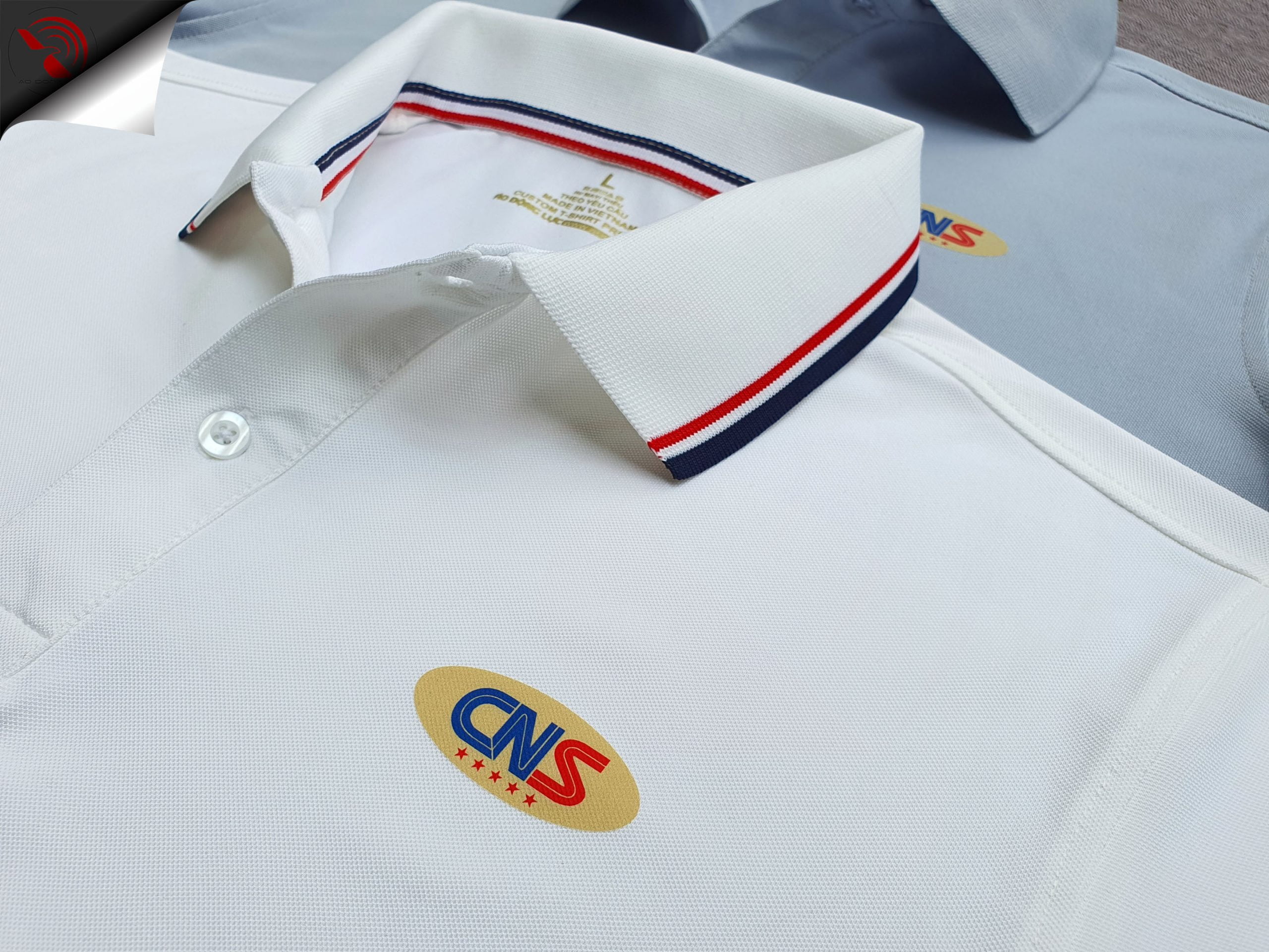 Đồng phục áo thun polo bo trơn in kỹ thuật số logo