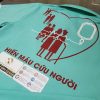 Đồng phục áo thun polo xanh ngọc phối đỏ in chuyển nhiệt kết hợp decal