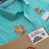 Đồng phục áo thun polo bo trơn màu xanh ngọc in decal