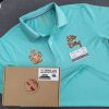 Đồng phục áo thun polo bo trơn màu xanh ngọc in decal