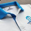 Đồng phục áo thun polo trắng phối bo tay bo cổ trụ trong xanh ya in chuyển nhiệt logo