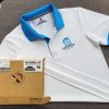 Đồng phục áo thun polo trắng phối bo tay bo cổ trụ trong xanh ya in chuyển nhiệt logo