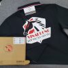 Đồng phục áo thun polo bo sọc màu đen in decal logo