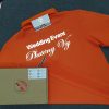 Đồng phục áo thun polo bo trơn màu cam in decal phản quang