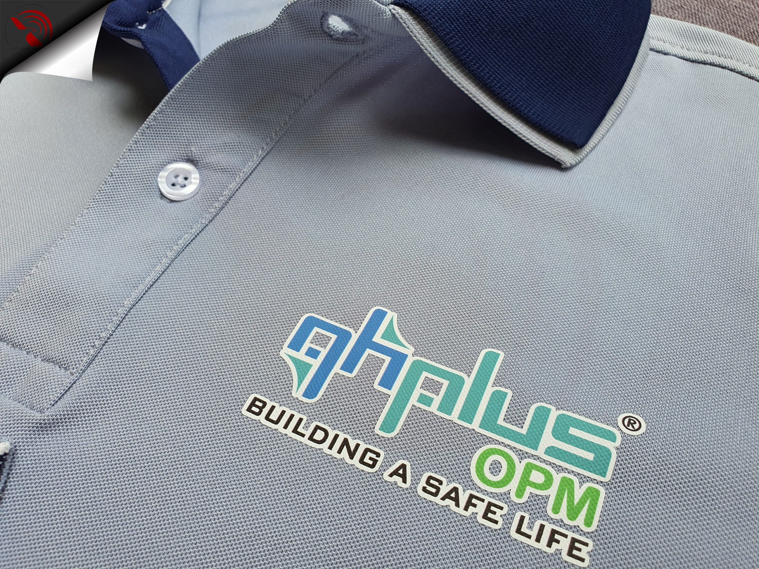 Hình in decal lên áo thun đồng phục polo xám lam phối 2 lá cổ